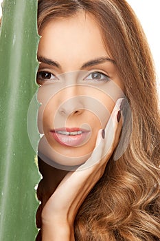 Lovely woman with aloe vera