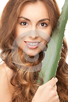 Lovely woman with aloe vera