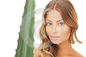 Lovely woman with aloe vera