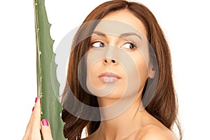 Lovely woman with aloe vera