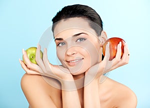 Lovely woman with apple