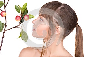 Lovely woman with apple twig