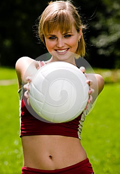 Lovely woman with a ball