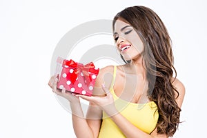 Lovely woman holding present box