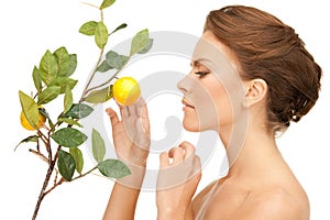 Lovely woman with lemon twig