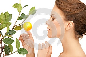 Lovely woman with lemon twig