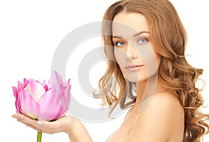 Lovely woman with lotos flower