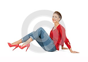 Lovely woman in red blouse and jeans