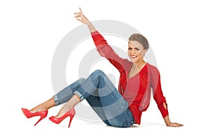 Lovely woman in red blouse and jeans