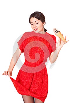 Lovely woman in a red dress soiled ice cream