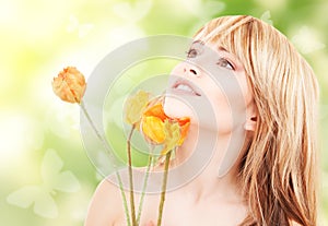 Lovely woman with red flowers and butterflies