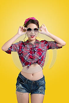 Lovely woman retro portrait with pin-up make-up and hairstyle w