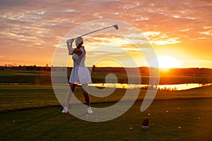 Lovely Woman in Uniform Hit Golf Ball .