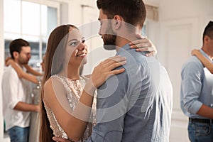 Lovely young couple dancing together