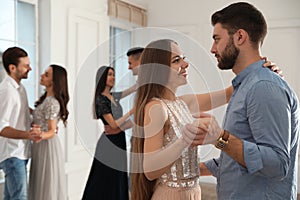 Lovely young couple dancing together