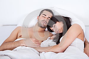 Lovely young couple sleeping