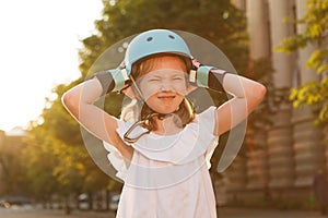 Lovely young girl enjoying rollerblading outdoors