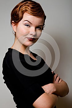 Lovely young woman with dollar sign on face