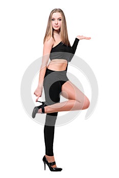 Lovely young woman in skintight black costume photo
