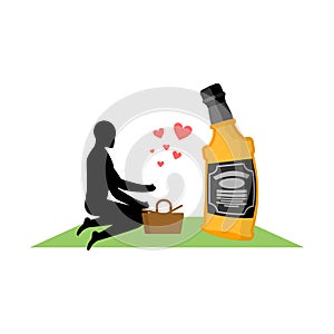 Lover alcohol drink. Man and bottle of whiskey on picnic. blanket and basket for food on lawn. Romantic date. Alcoholic Lifestyle