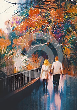 Lover couple walking in autumn park