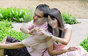 Lover couples sit in the garden3