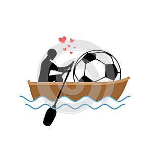 Lover Soccer. Guy and football ball ride in boat. Lovers of sail