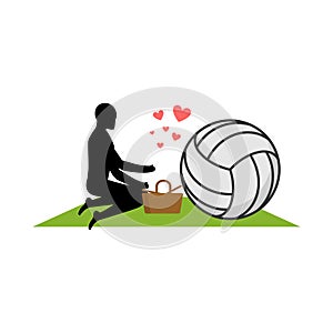 Lover volleyball. Guy and ball on picnic. Meal in nature. blanket and basket for food on lawn. Romantic date. Love sport play ga