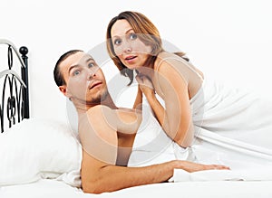 Lovers caught in bed