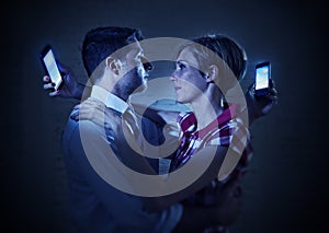 Lovers couple of internet and mobile phone addict ignoring each other