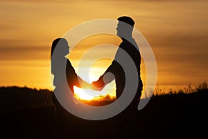 Lovers couple in sunset time