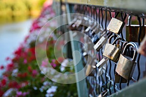 Lovers locks on the Kisses Bridge, in Comana, Romania.