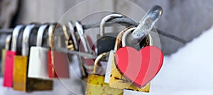 Lovers / Love Symbol / Valentine`s Day background banner panorama - Many colorful different Love heart padlocks / curtain lock