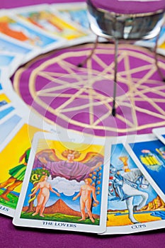 The Lovers, Tarot cards on a magical pentagram.