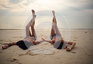 Lovers young couple of girls. On the beach . Concept of LGBT