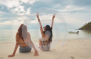 Lovers young couple of girls. On the beach . Concept of LGBT