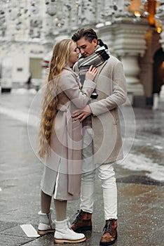 lovestory couple Love coat beige gray white bouquet of flowers tenderness feelings walk Hug date