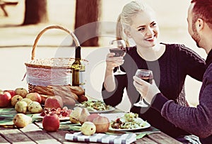 Loving beautiful happy couple drinking wine