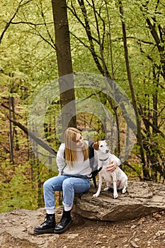 Loving blonde hiker, dressed in jeans