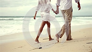 Loving couple on beach in slow motion