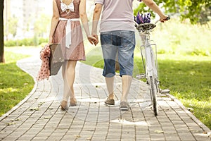 Loving couple with bicycle