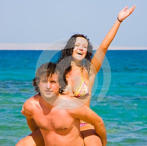 Loving couple embracing on beach