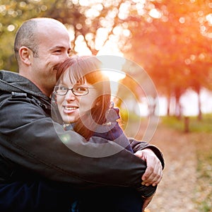 Loving couple embracing in the park