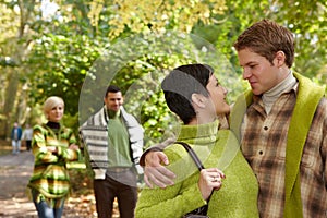 Loving couple embracing in park