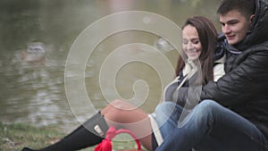 Loving couple embracing sitting