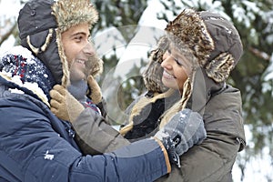 Loving couple embracing at winter