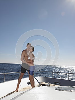 Loving Couple Embracing On Yacht