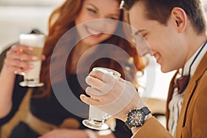 A loving couple enjoying an coffee in the cafÃÂ©