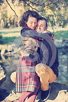 Loving couple hugging in the park