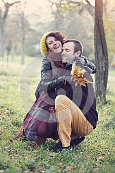 Loving couple hugging in the park
